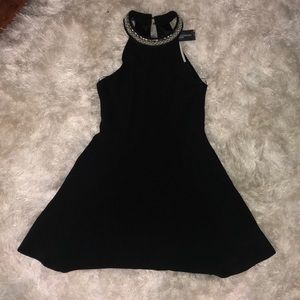 Black dress with beaded neck